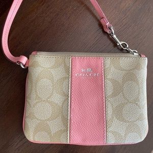 Beautiful Coach wallet/purse with pink trim!